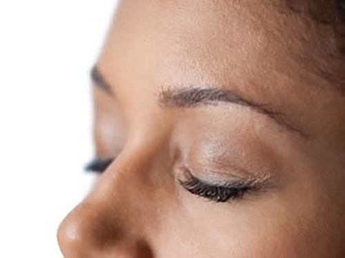 The upper part of a person's face with their eyes closed icon