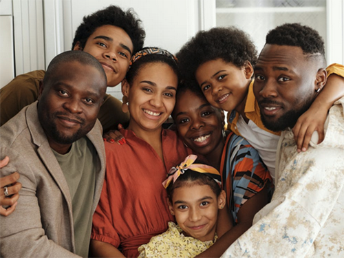 A family in a group hug icon